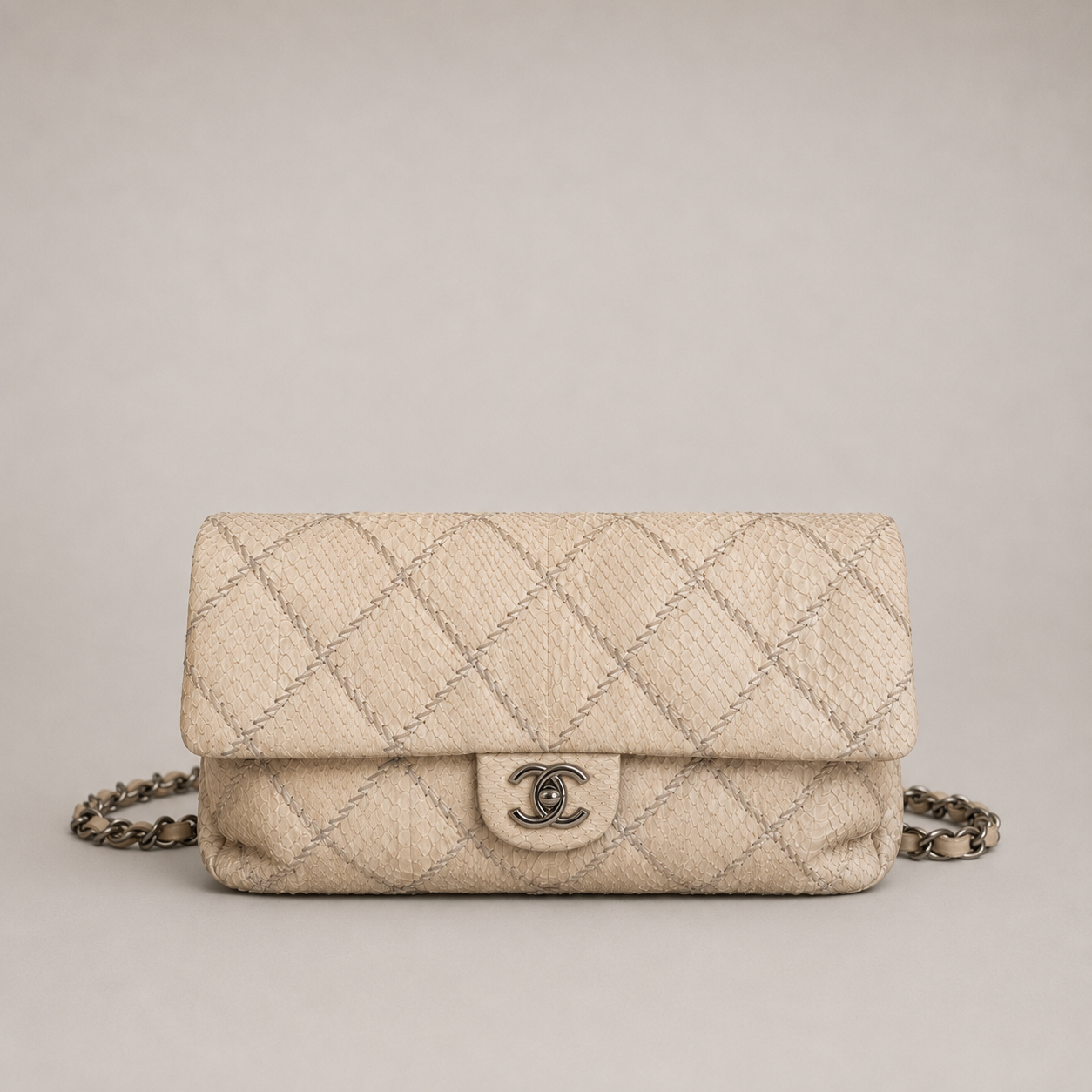 CHANEL ULTIMATE STITCH EAST-WEST WATER SNAKE FLAP BAG – BEIGE